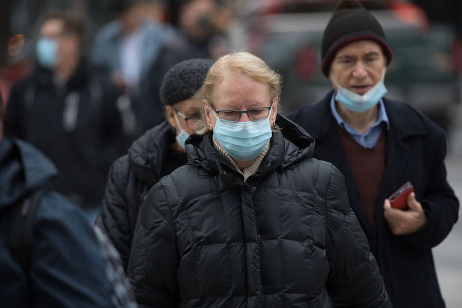 A photo of people wearing masks in Toronto during the COVID-19 pandemic on November 27, 2020