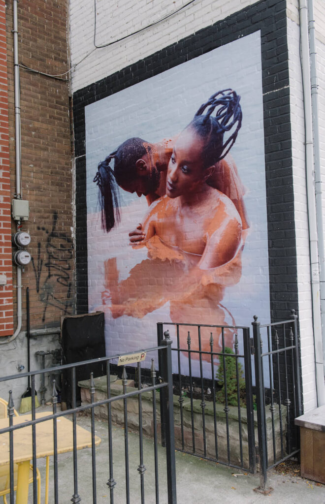 Mallory Lowe's photo on the side of OCR (145 Ossington)