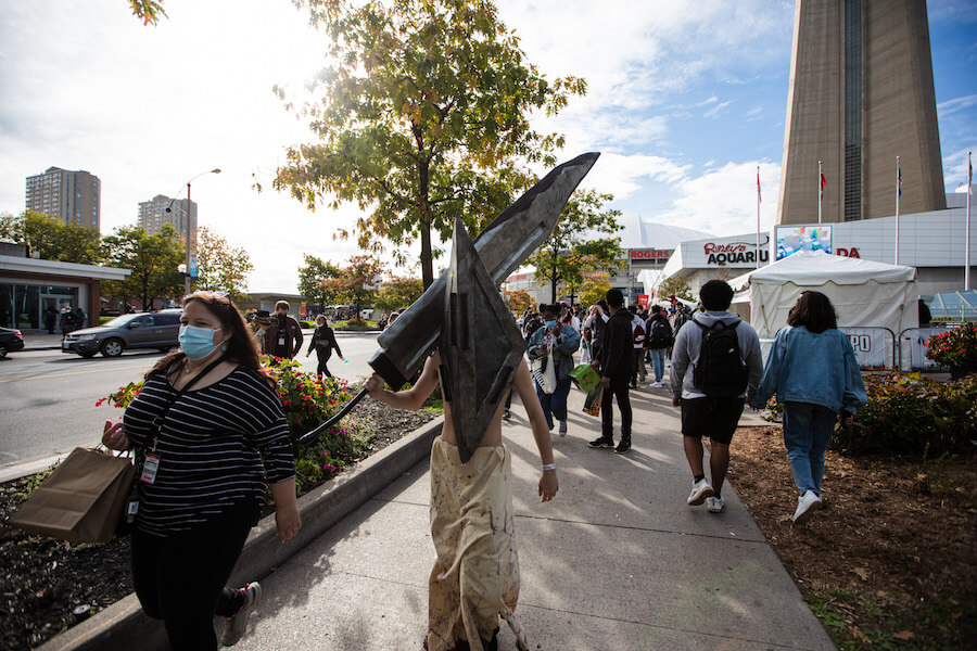 Fans arrive at Fan Expo Canada 2021 near the CN Tower
