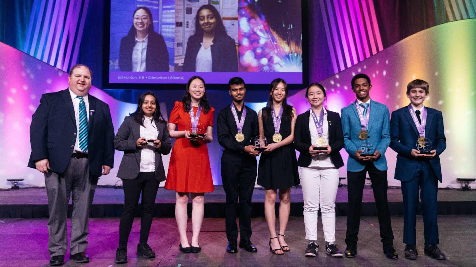 Bright young students receiving awards at a science or academic competition, fostering youth achievement and education excellence, with colorful stage lighting and medals, Toronto events.