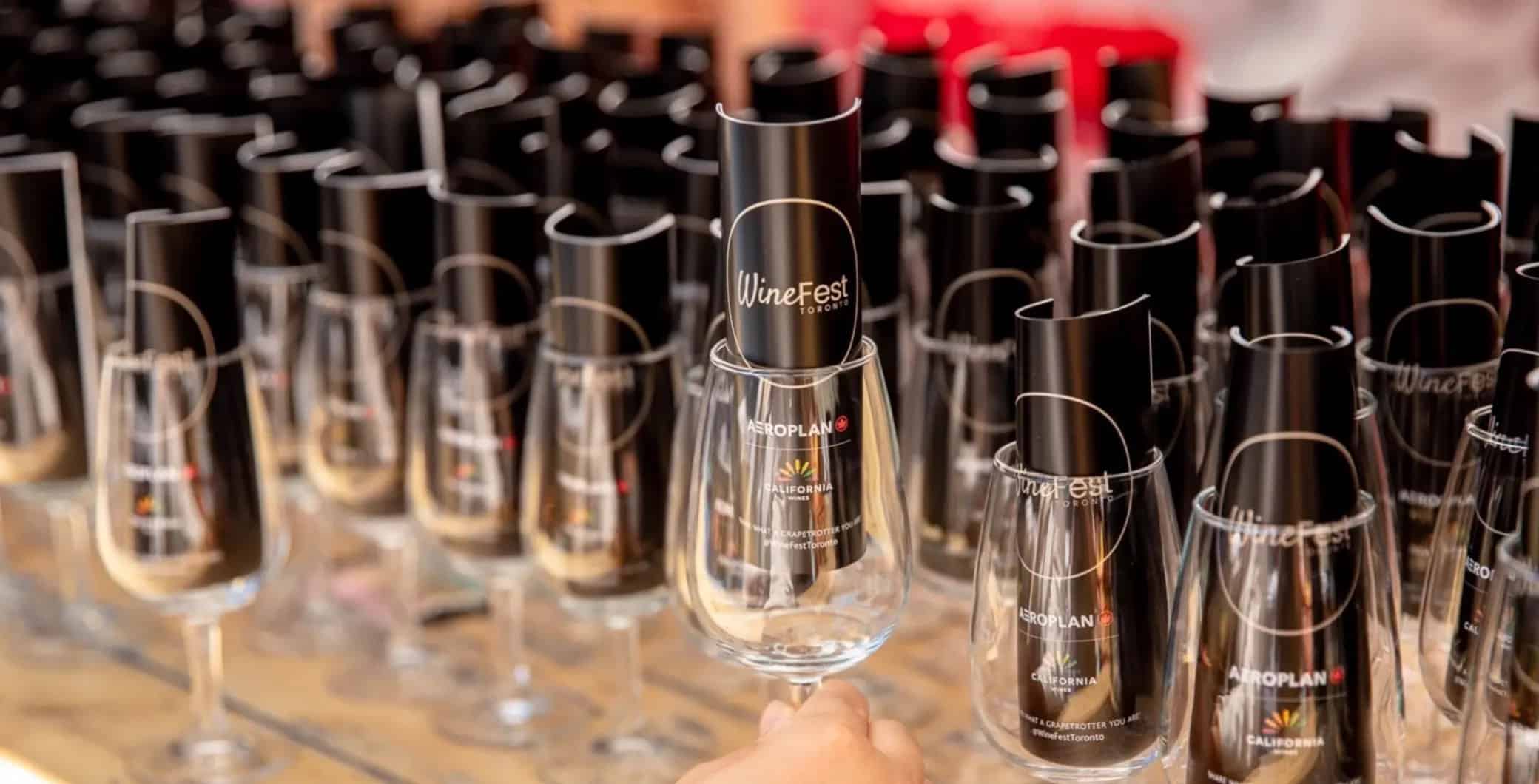 Elegant wine glasses display at Toronto WineFest event in downtown Toronto, showcasing local wineries and wine tasting experiences in the Ontario wine region, perfect for wine enthusiasts.