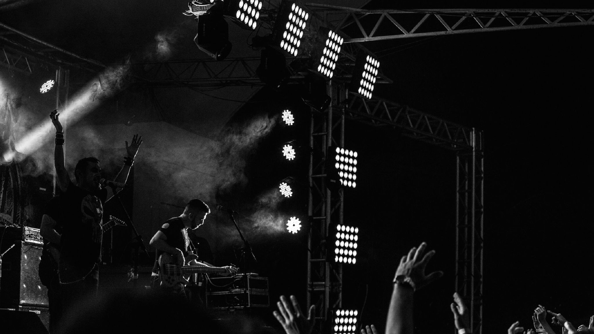 Live music performance at the NOW Toronto festival featuring musicians on stage with vibrant lighting and energetic atmosphere.