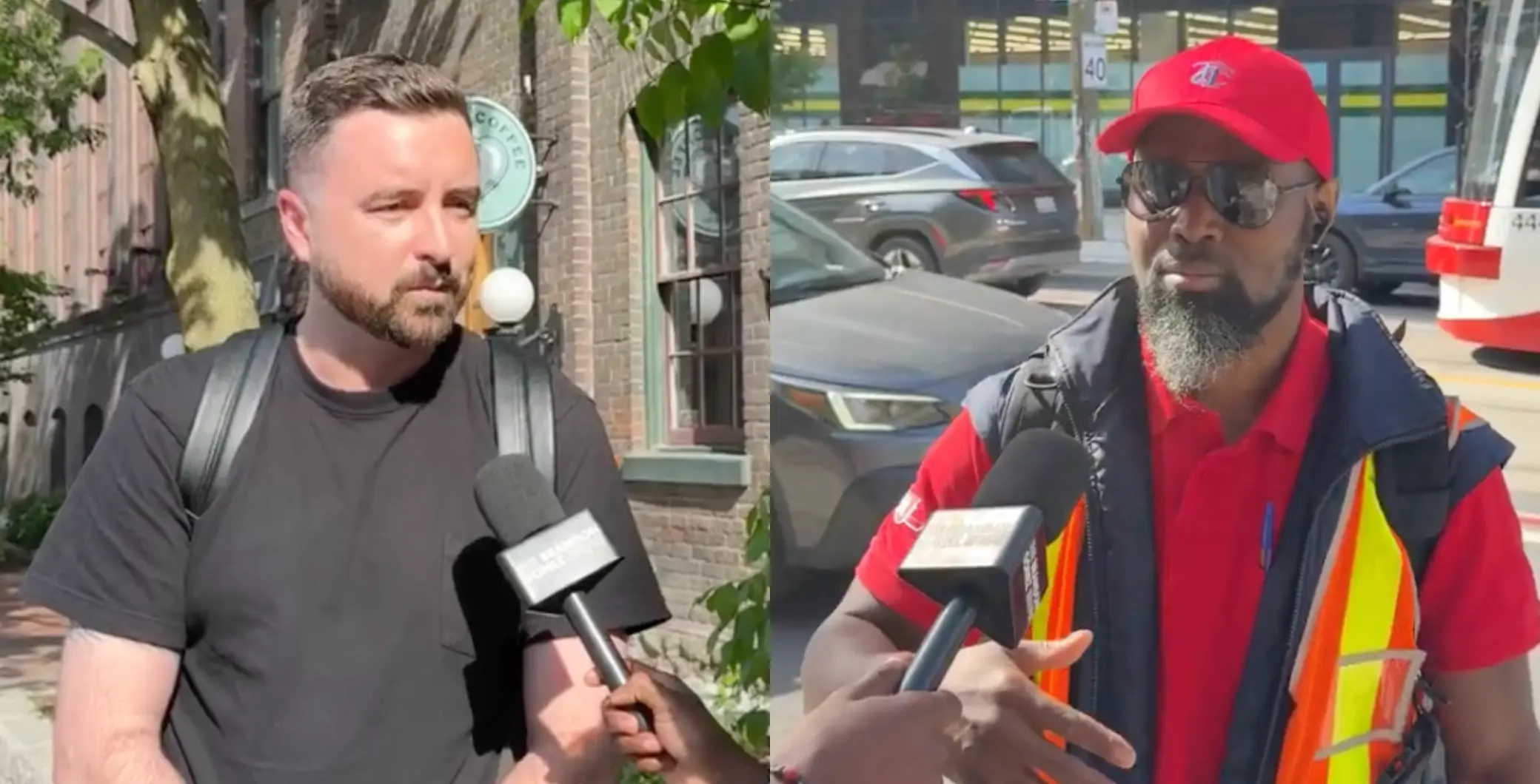 A man with a beard and black t-shirt being interviewed outdoors, with another man in a red cap and safety vest holding a microphone, in an urban setting with cars and trees in the background.