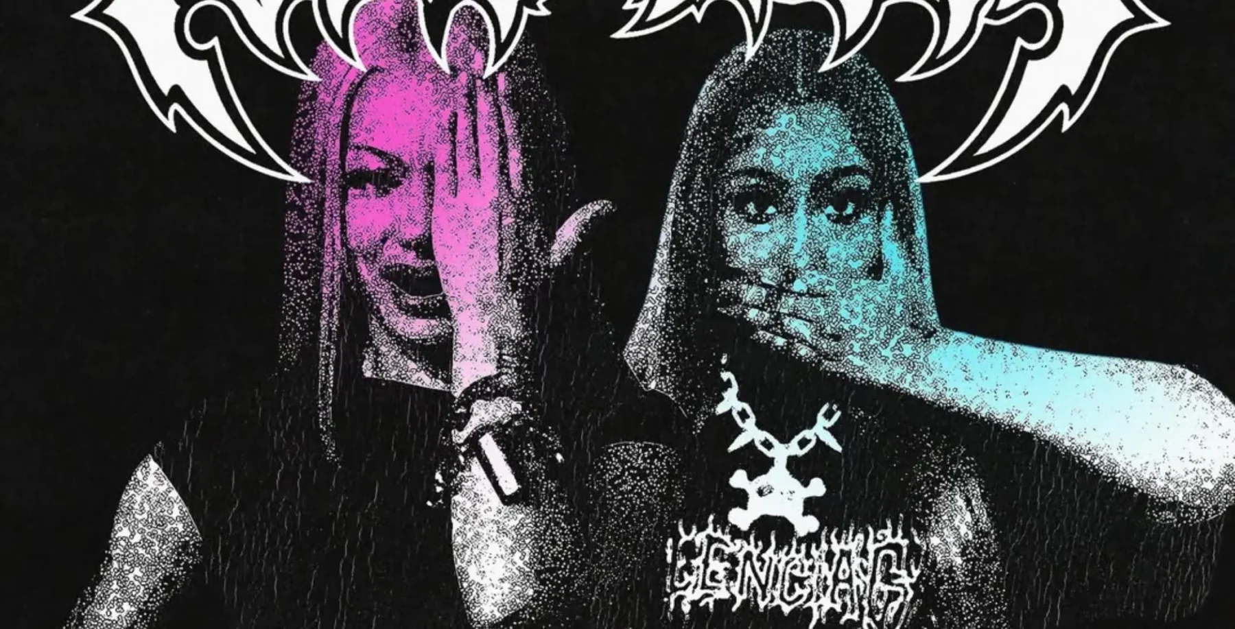 Two young women with colorful hair and gothic style clothing posing together, one covering her face and the other smiling, against a dark background.