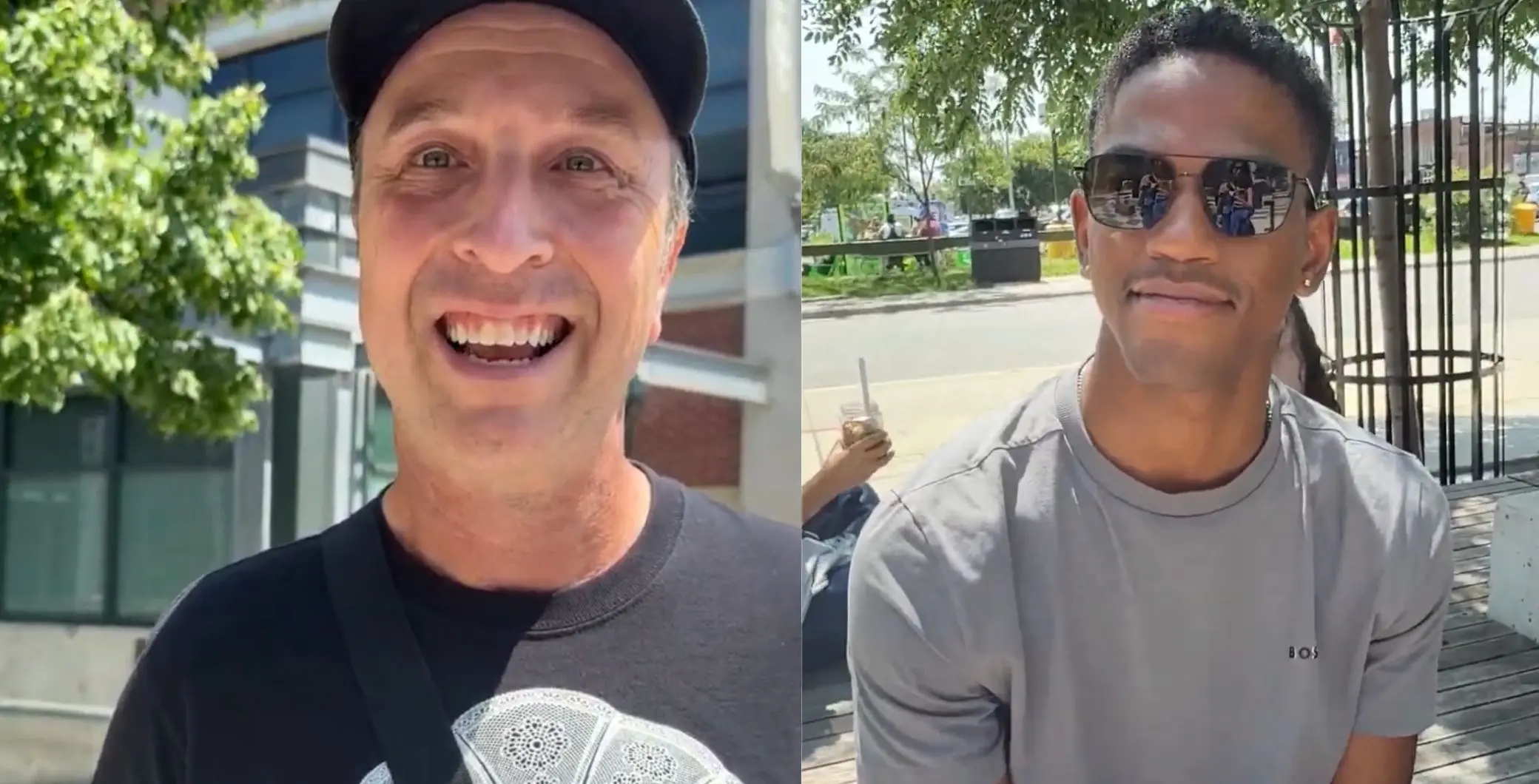 Two men smiling outdoors in Toronto, one wearing a black cap and the other sunglasses, with trees and cityscape in the background.